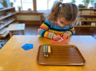 Young girl doing class work